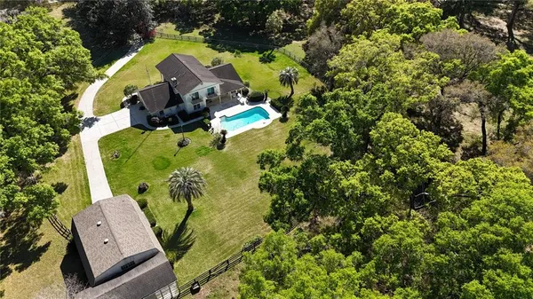 an aerial view of a swimming pool