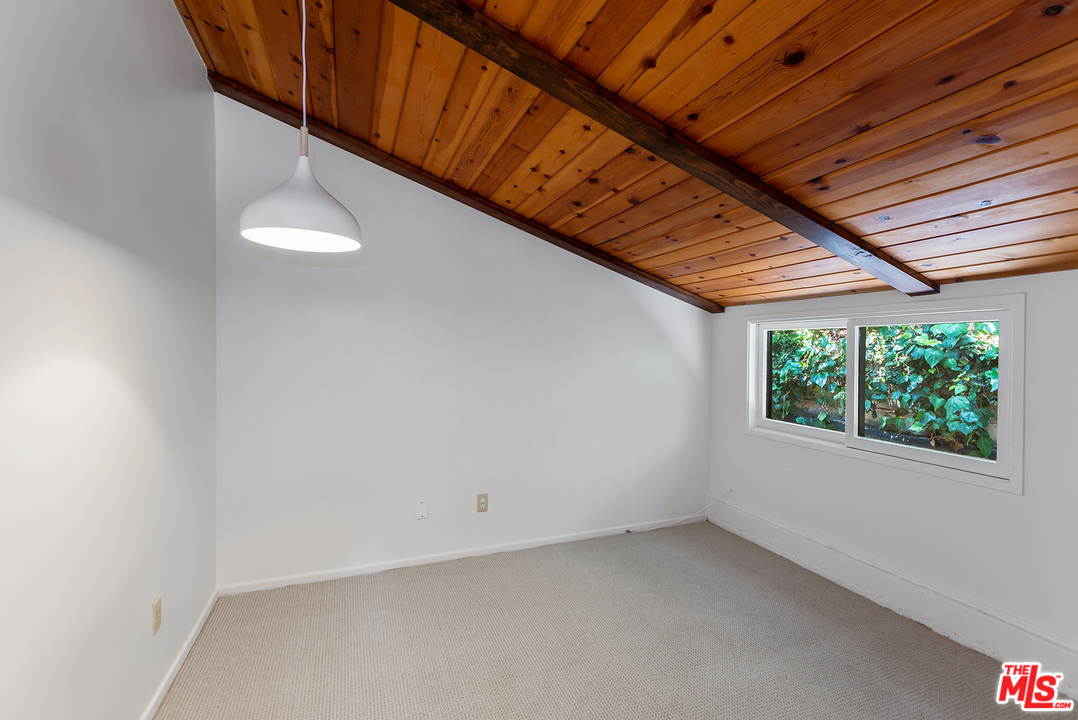 13238 Riviera Ranch Road Los Angeles, CA 90049 - Photo 23 of 28 a view of a room with window