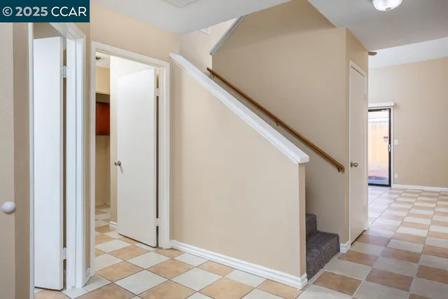 a view of a hallway with entryway