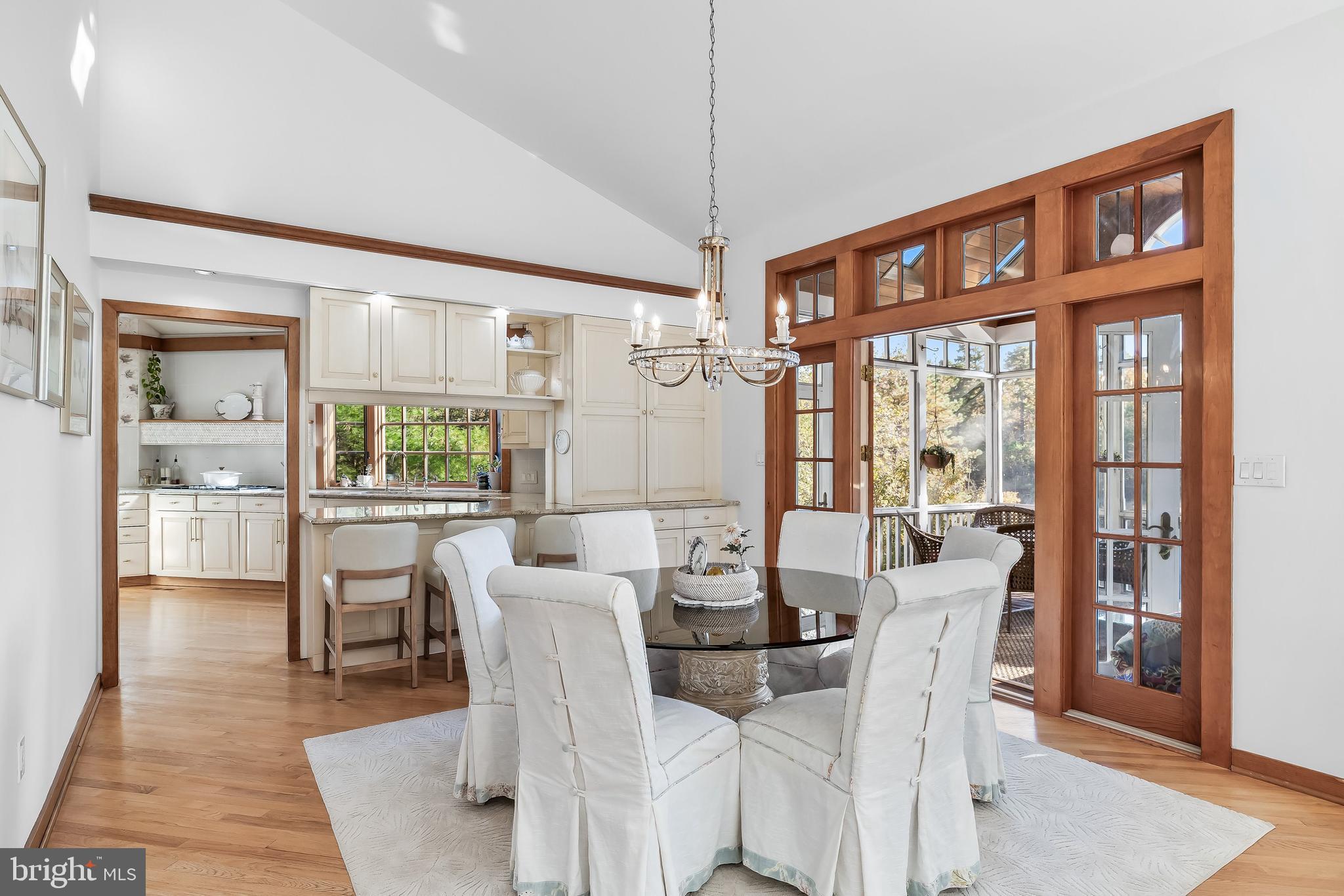 286 Chippewa Trail Medford Lakes, NJ 08055 - Photo 19 of 120 a dining room with furniture wooden floor a potted plant and a chandelier