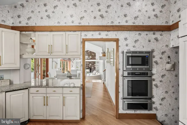 a picture of a bathroom with a shower