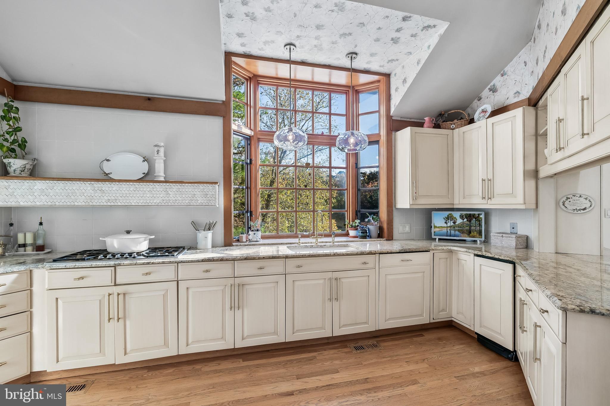 286 Chippewa Trail Medford Lakes, NJ 08055 - Photo 23 of 120 a kitchen with a sink window and cabinets