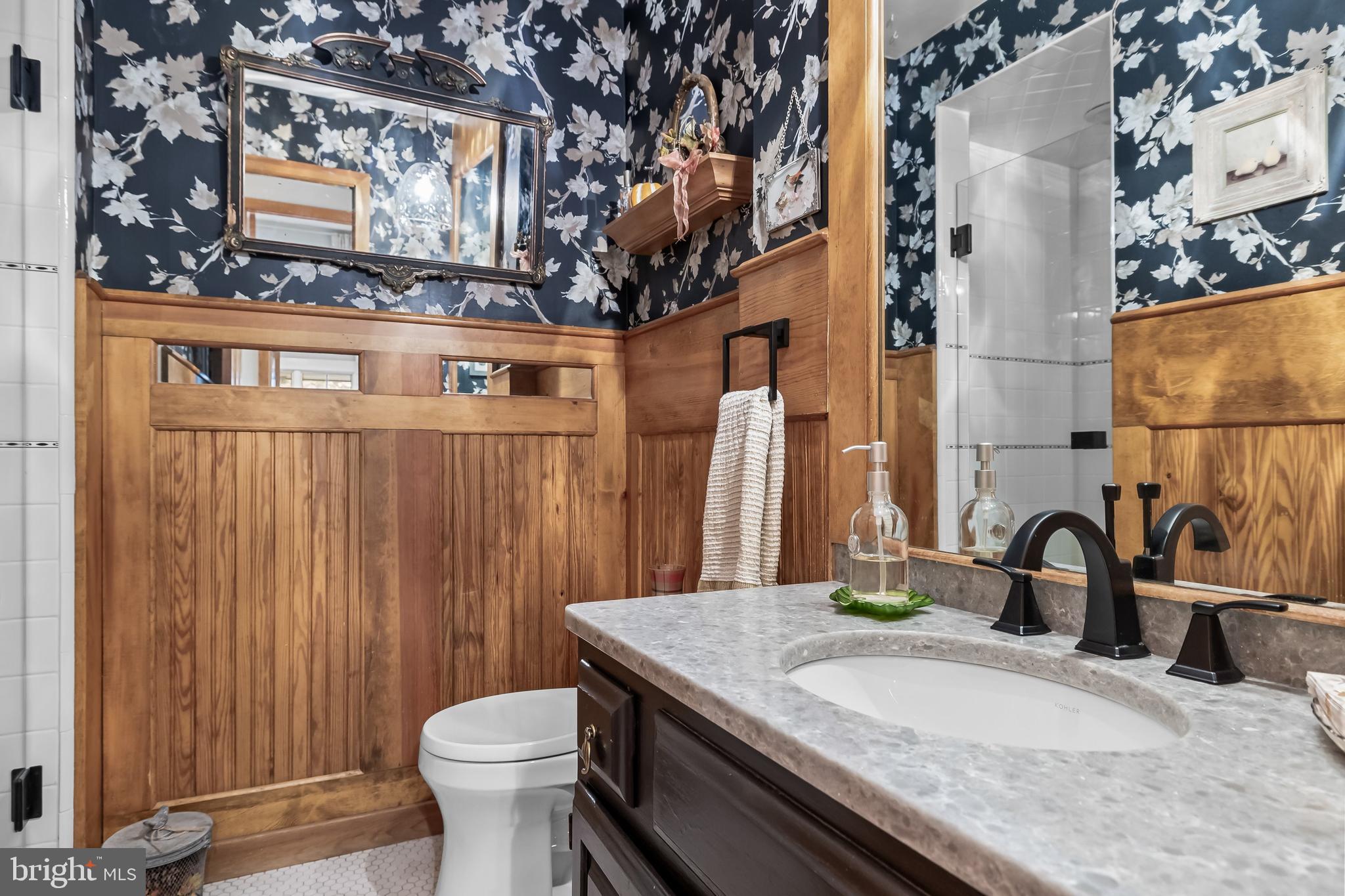 286 Chippewa Trail Medford Lakes, NJ 08055 - Photo 31 of 120 a bathroom with a granite countertop sink a toilet and a mirror