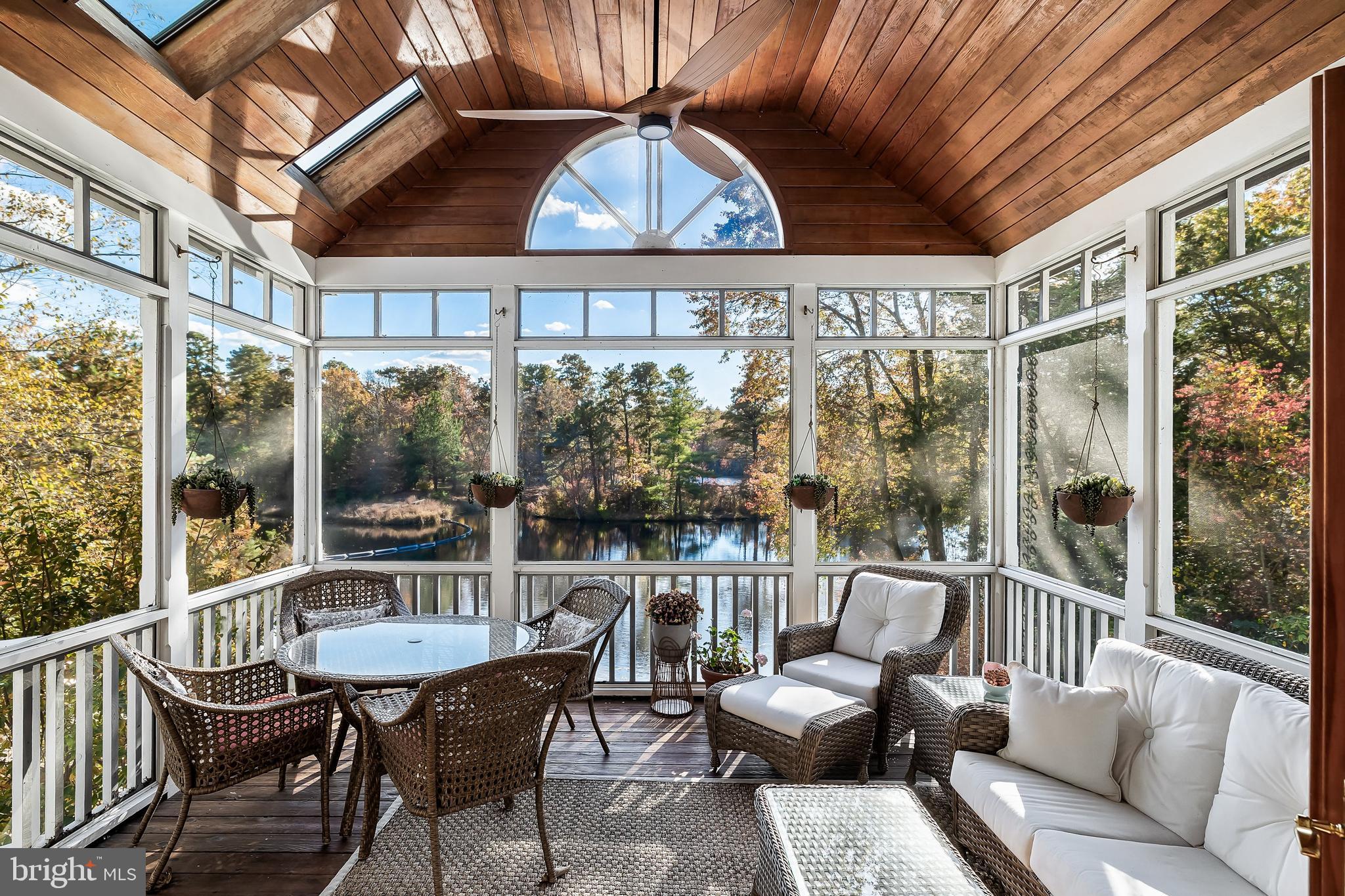 286 Chippewa Trail Medford Lakes, NJ 08055 - Photo 33 of 120 a view of a chair and tables in the balcony