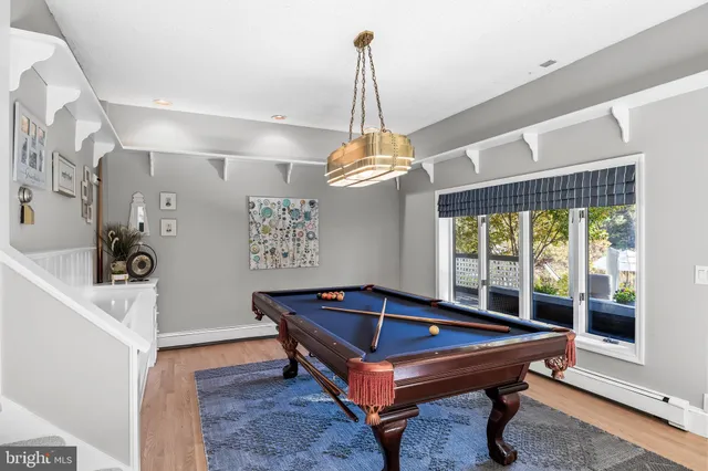 a view of a storage room with a refrigerator