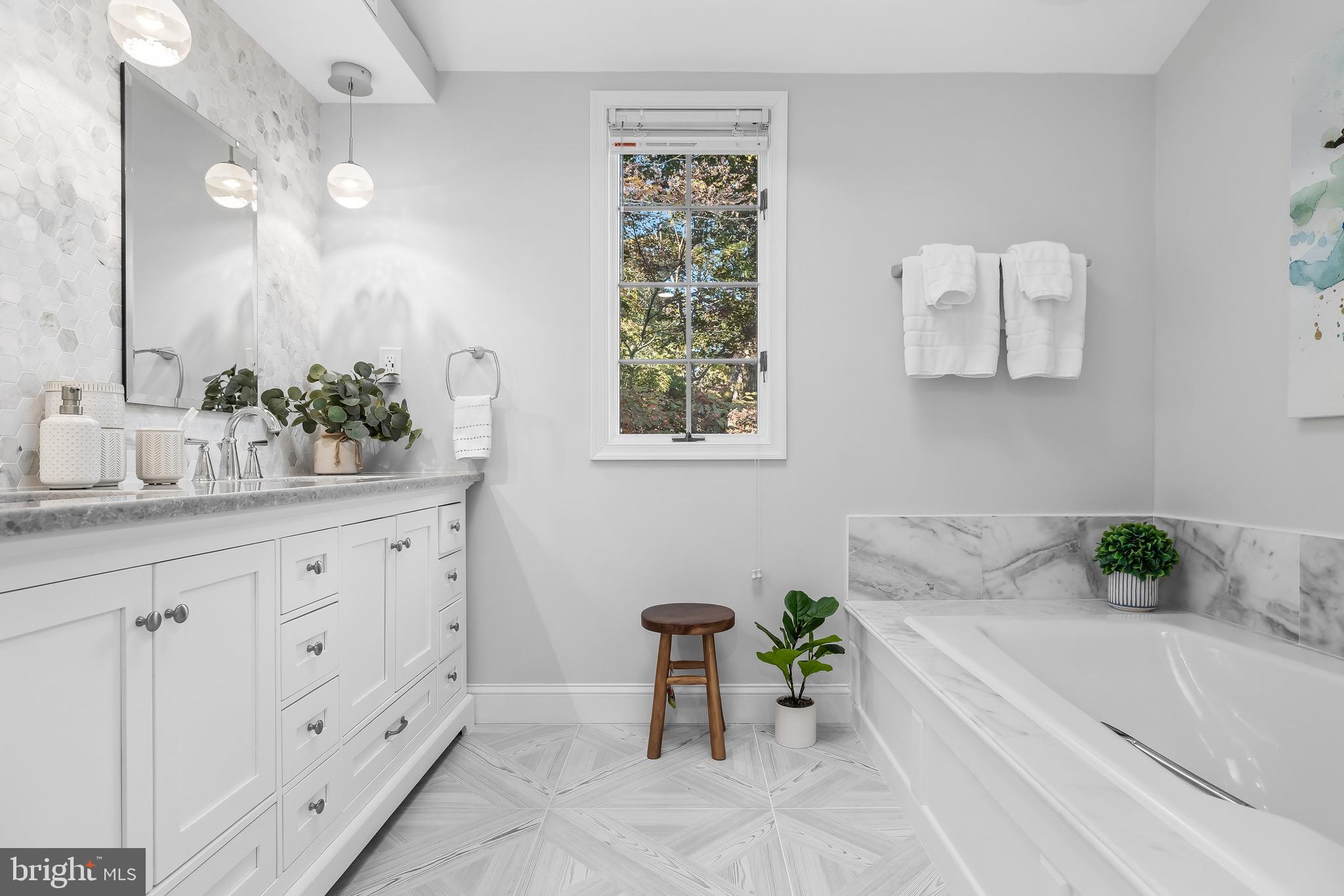 286 Chippewa Trail Medford Lakes, NJ 08055 - Photo 66 of 120 a bathroom with a sink and a bathtub