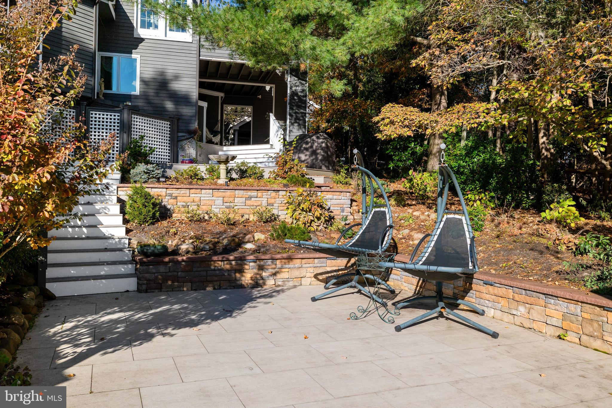 286 Chippewa Trail Medford Lakes, NJ 08055 - Photo 70 of 120 a view of a patio with a table and chairs