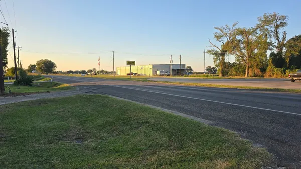 a view of a patio with a lake view
