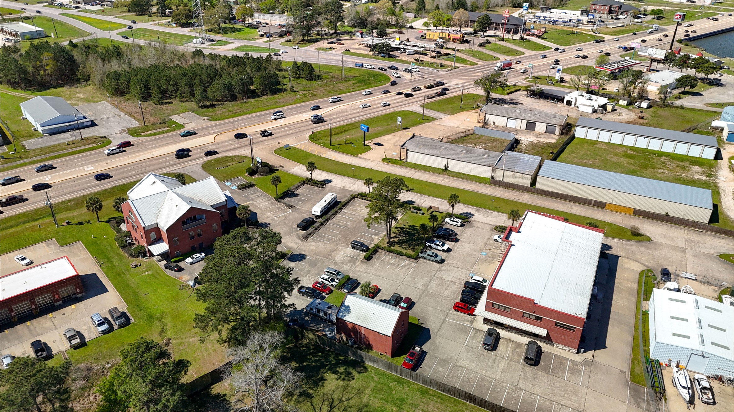 90 Beach Walk Boulevard Conroe, TX 77304 - Photo 11 of 26 an aerial view of residential houses with outdoor space