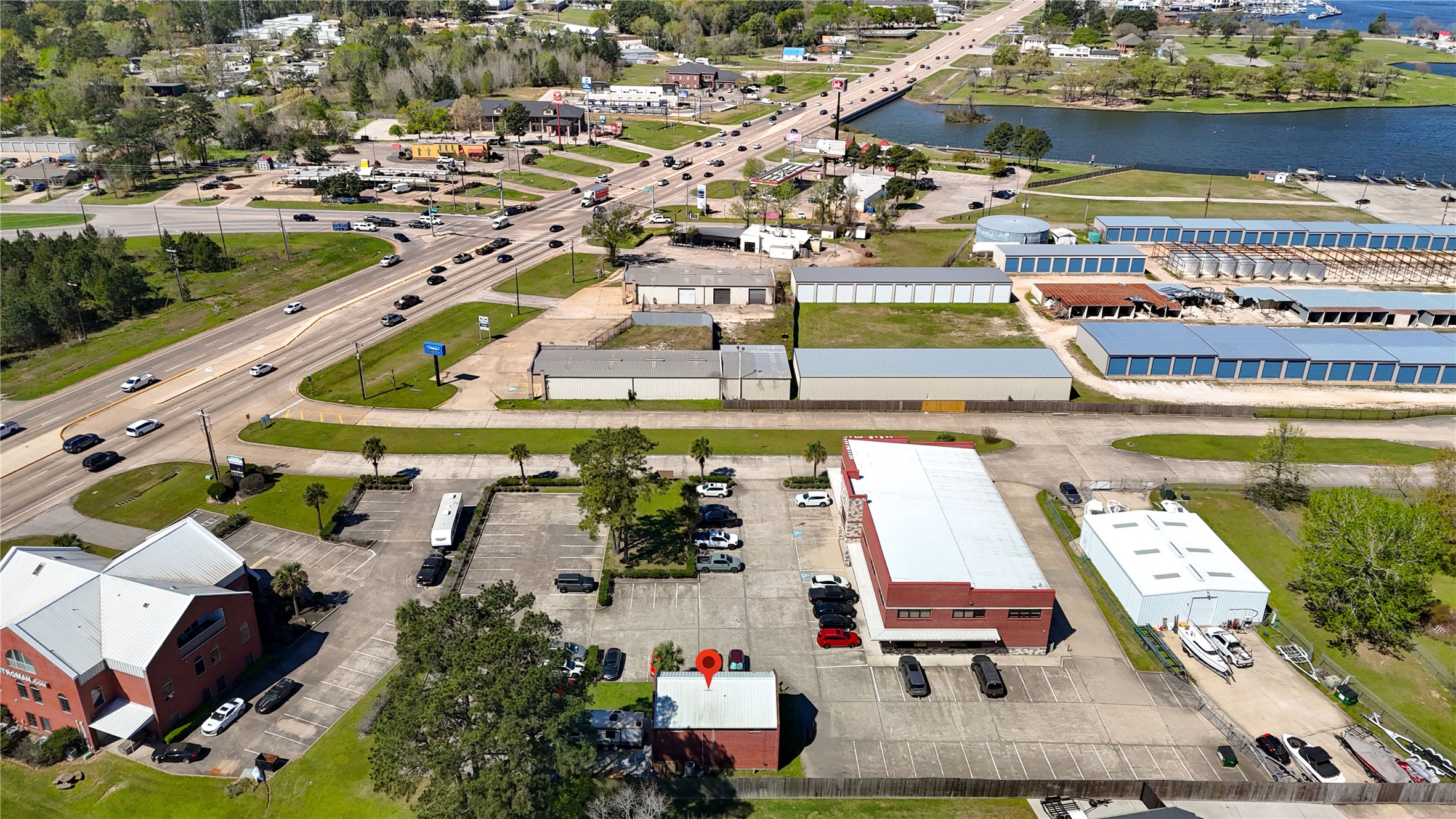 90 Beach Walk Boulevard Conroe, TX 77304 - Photo 12 of 26 an aerial view of residential houses with outdoor space