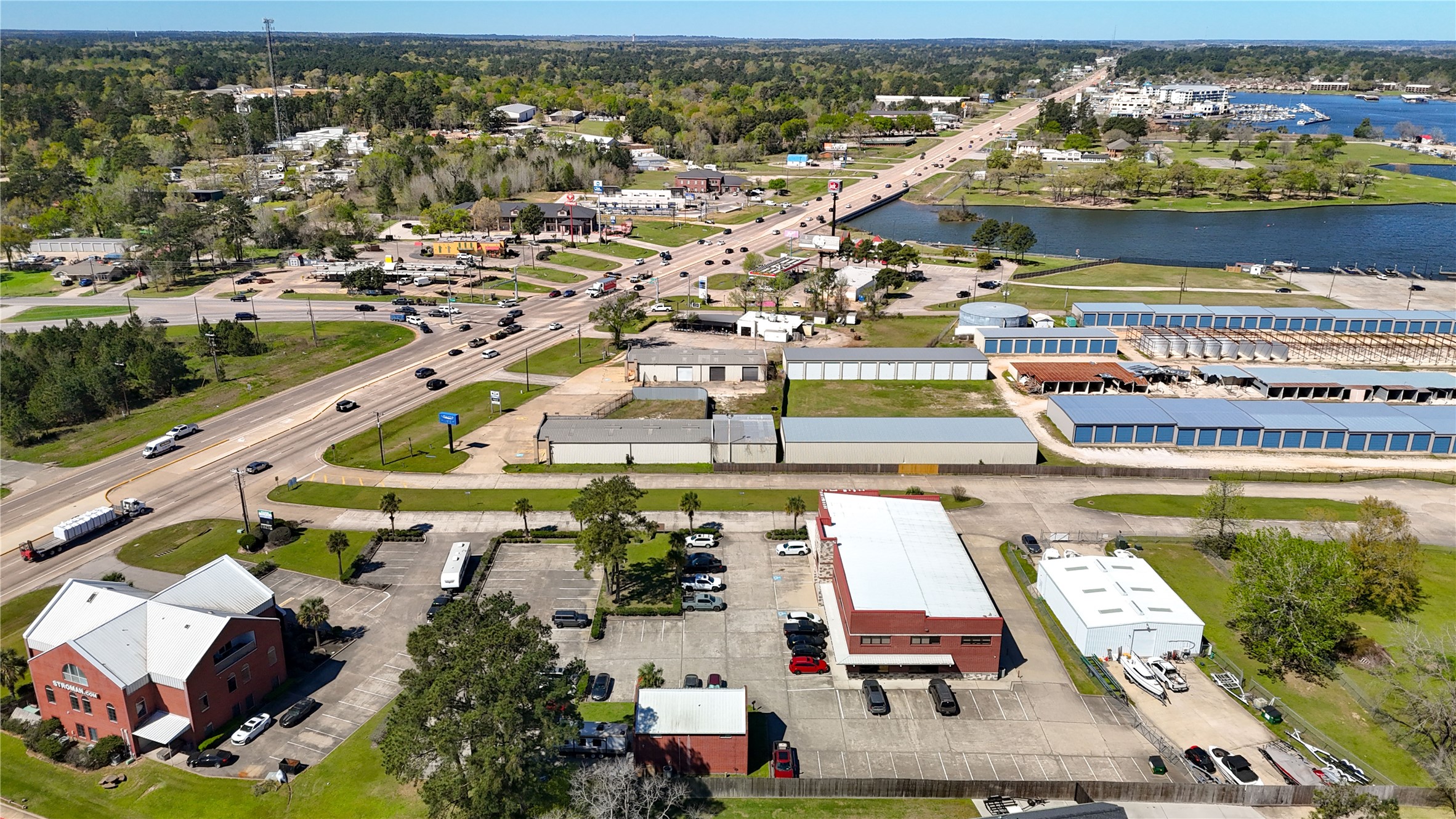 90 Beach Walk Boulevard Conroe, TX 77304 - Photo 13 of 26 an aerial view of residential houses with outdoor space