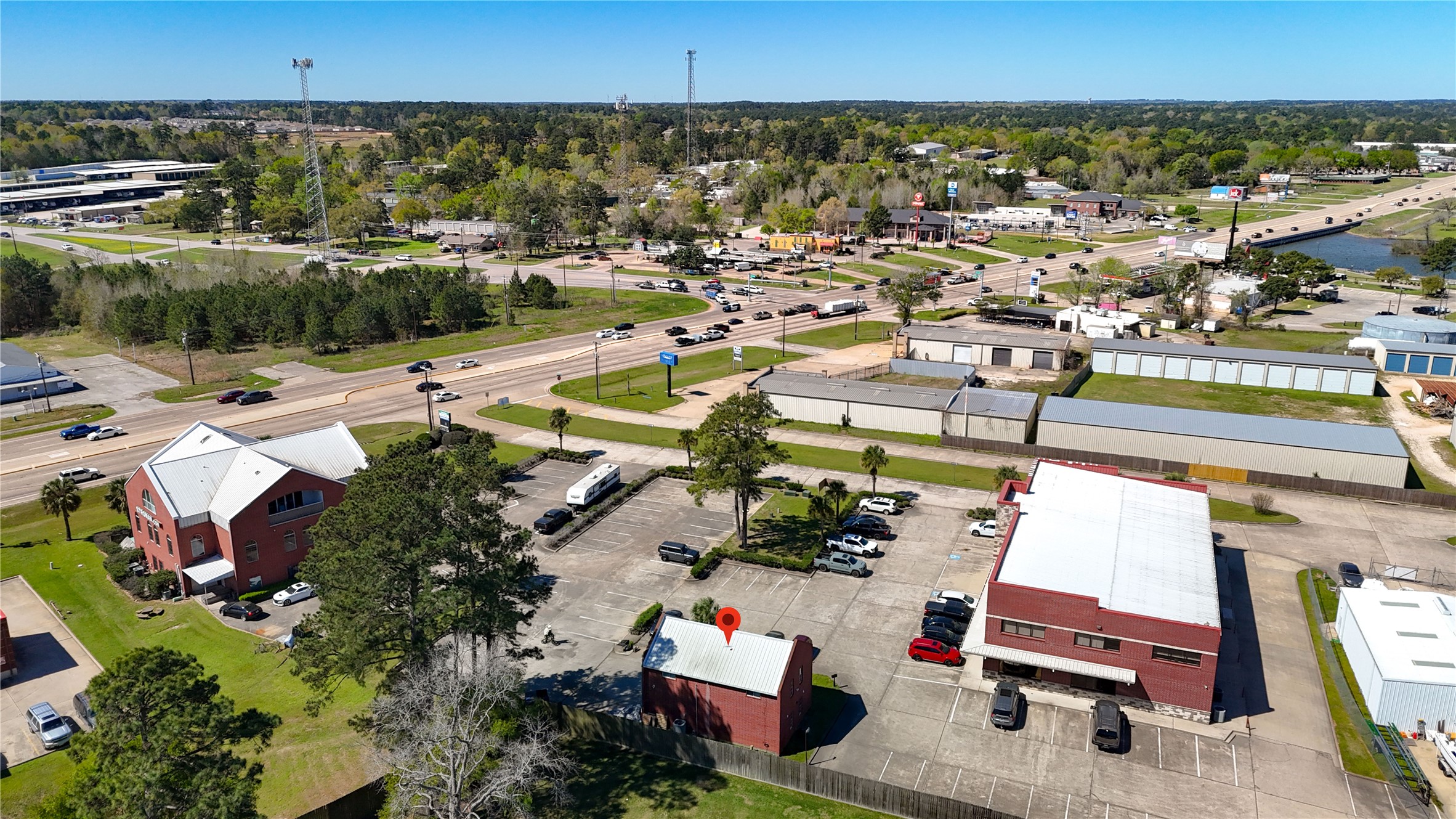 90 Beach Walk Boulevard Conroe, TX 77304 - Photo 14 of 26 an aerial view of residential houses with outdoor space