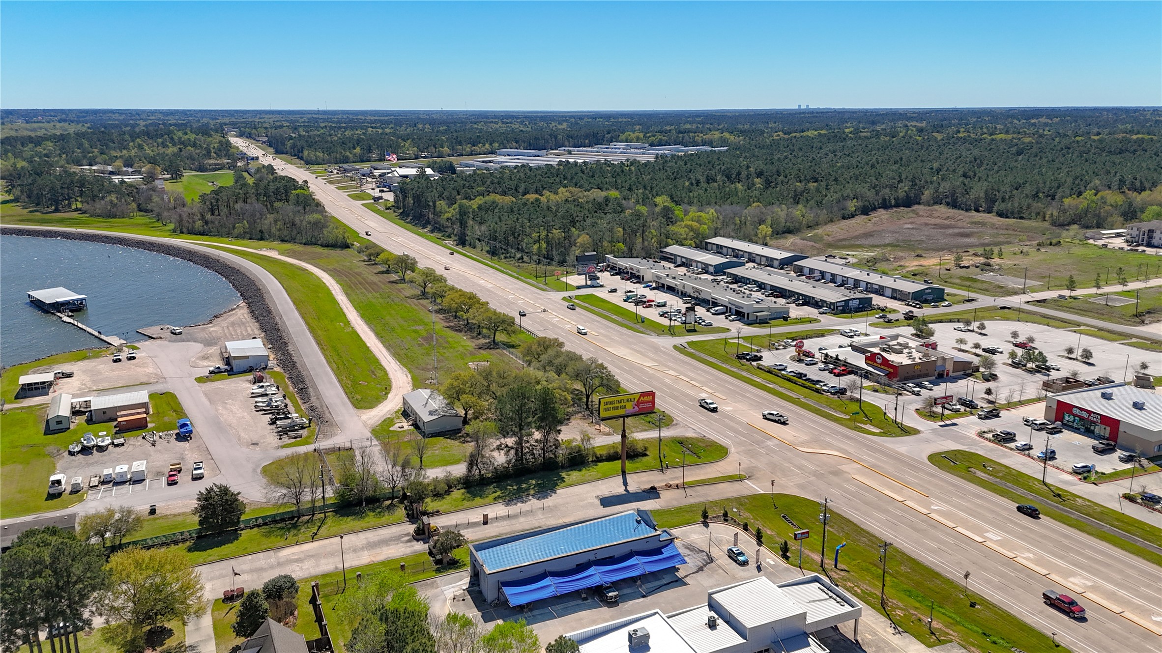 90 Beach Walk Boulevard Conroe, TX 77304 - Photo 21 of 26 an aerial view of a city