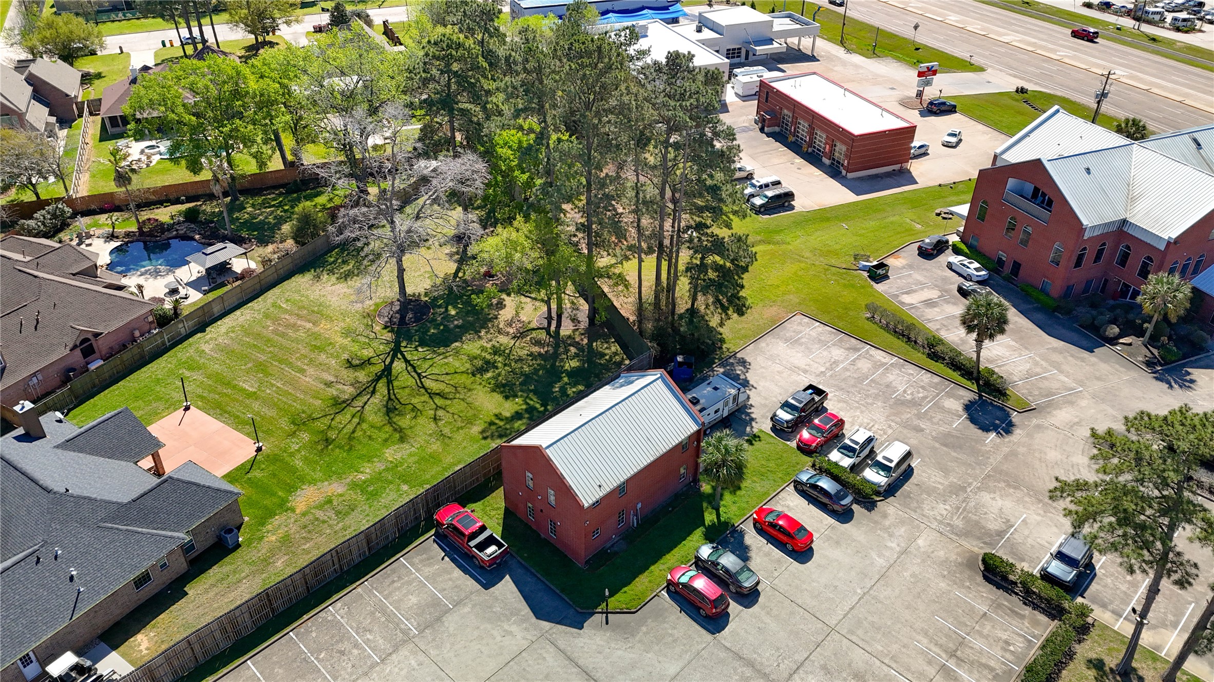 90 Beach Walk Boulevard Conroe, TX 77304 - Photo 6 of 26 an aerial view of a house swimming pool and outdoor seating