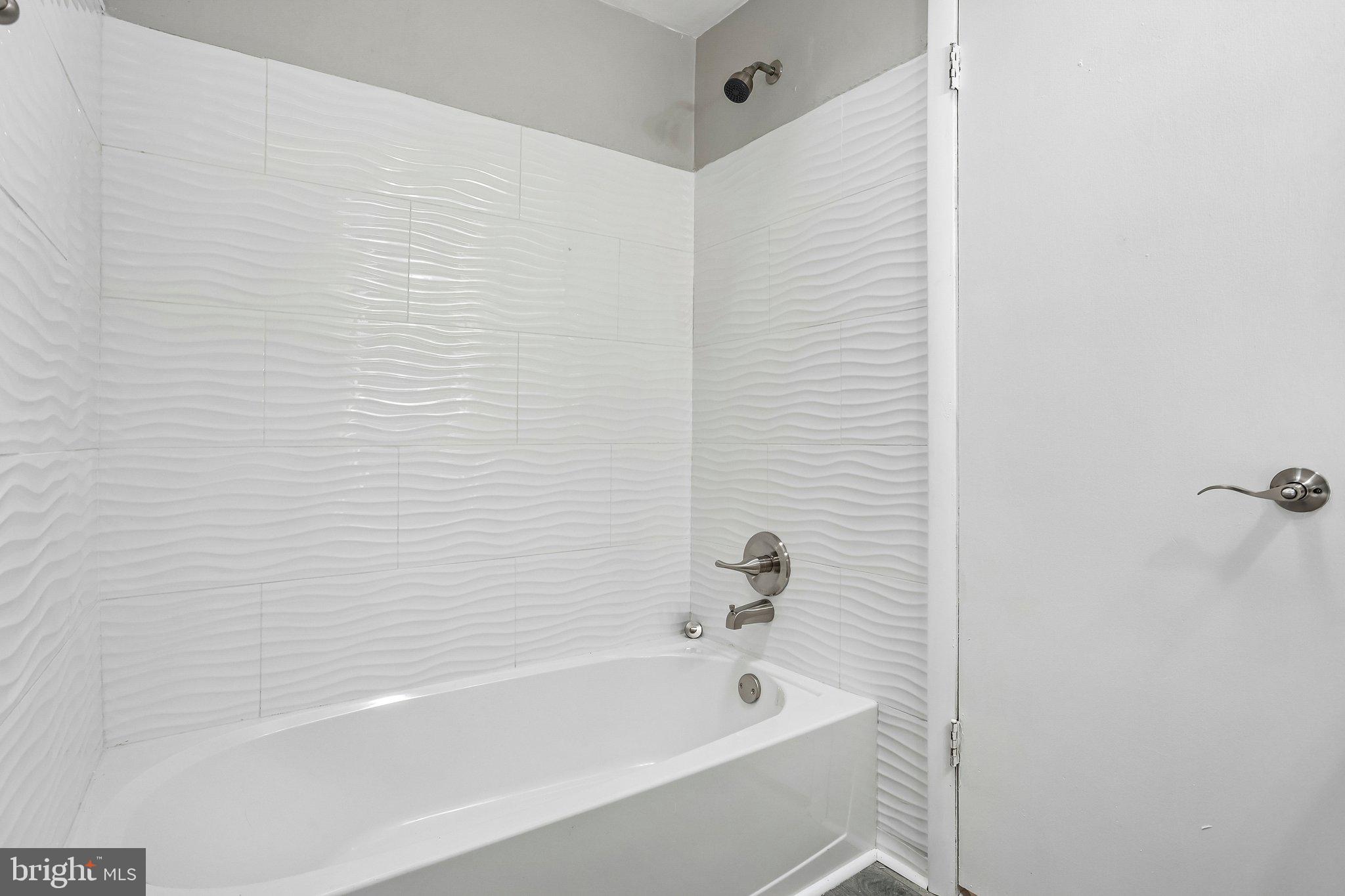4008 Powell Road Brookhaven, PA 19015 - Photo 18 of 34 Sleek, modern bathroom retreat.