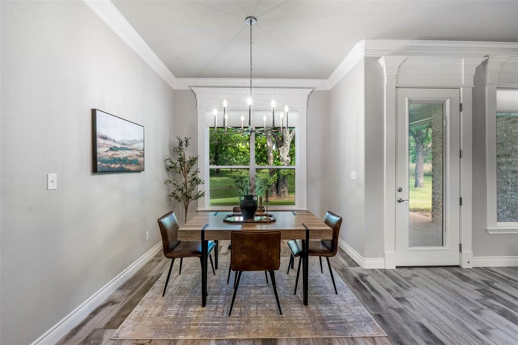 10301 Ravenswood Road Granbury, TX 76049 - Photo 15 of 38 Dining room with orchard views