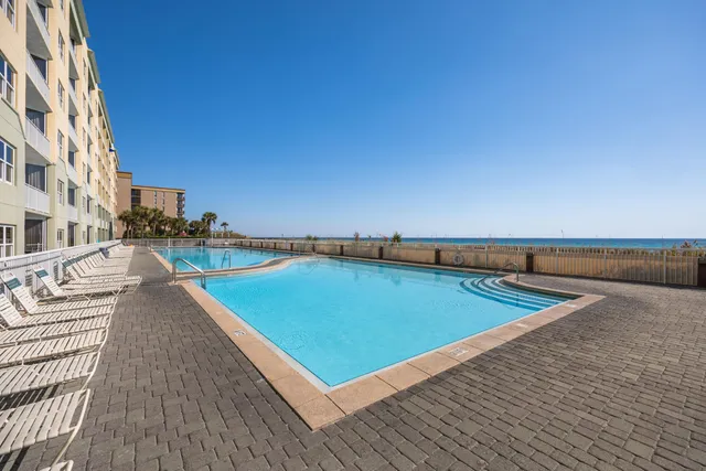 swimming pool with an outdoor seating