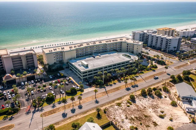 a view of a balcony with chairs