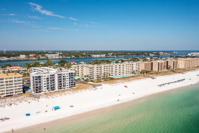 a view of a city with an ocean view