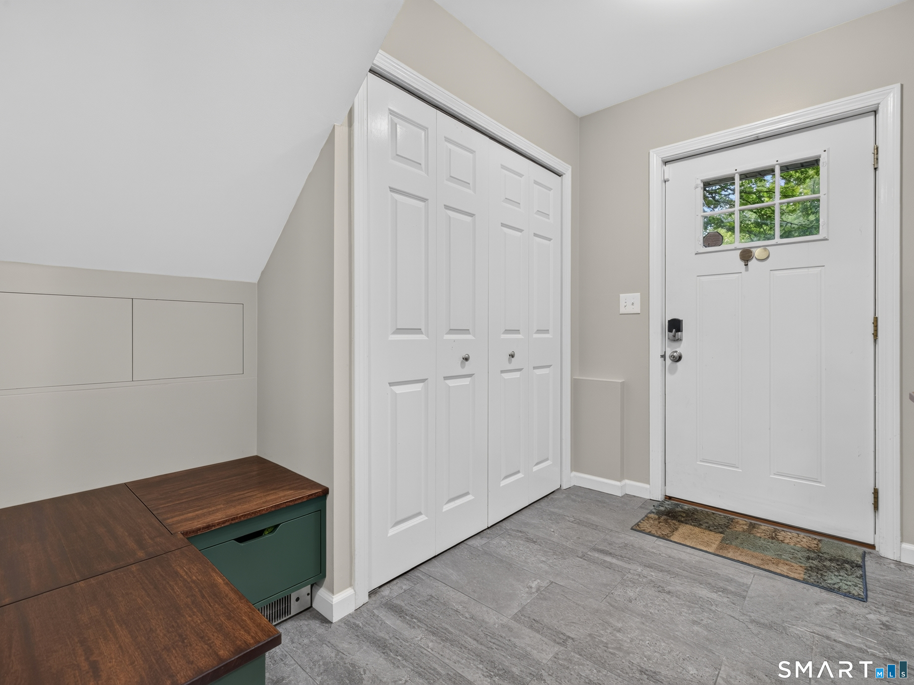 46 Spring Glen Road East Lyme, CT 06357 - Photo 3 of 40 Enter the foyer with built in storage