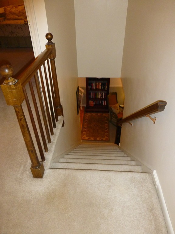 91 Drummer Road, Unit 91 Acton, MA 01720 - Photo 11 of 17 a view of stairs and an empty room