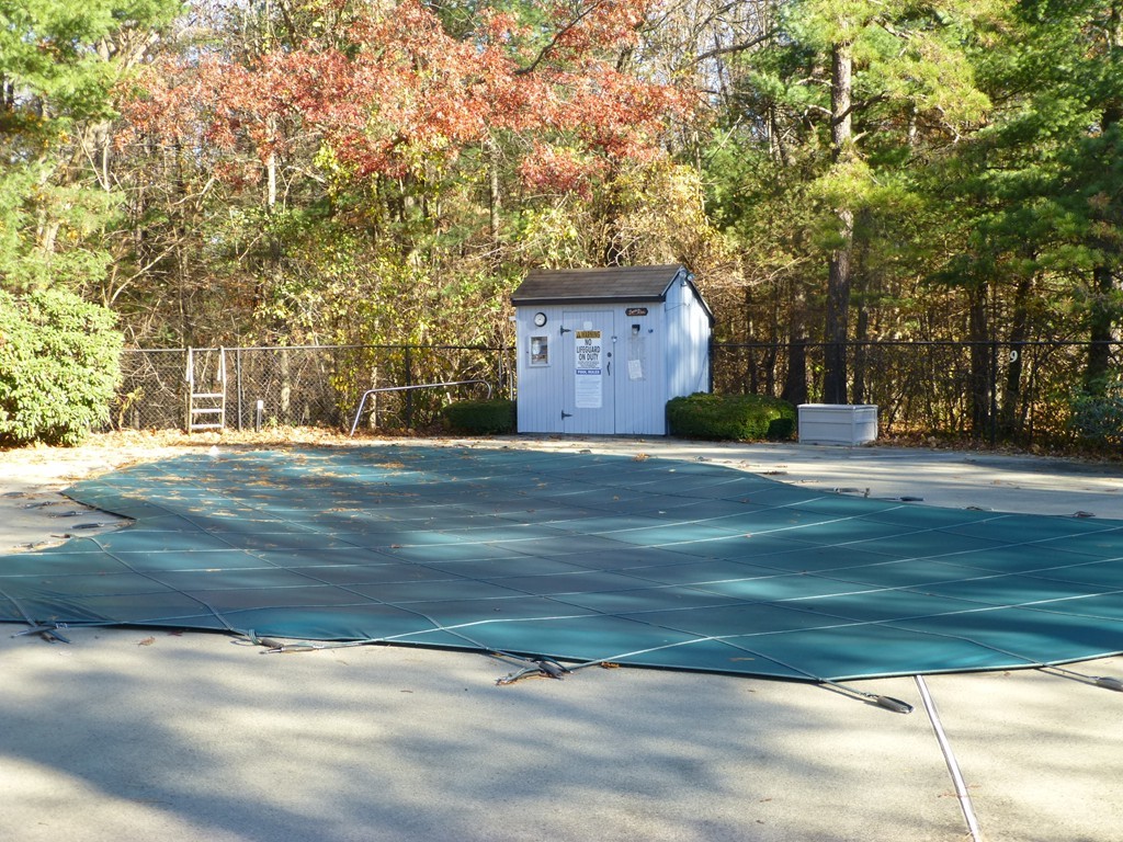 91 Drummer Road, Unit 91 Acton, MA 01720 - Photo 17 of 17 a view of a house with a yard