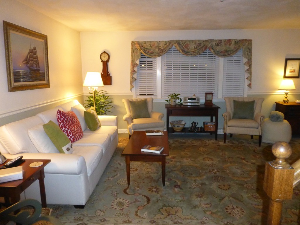 91 Drummer Road, Unit 91 Acton, MA 01720 - Photo 7 of 17 a living room with furniture and a large window