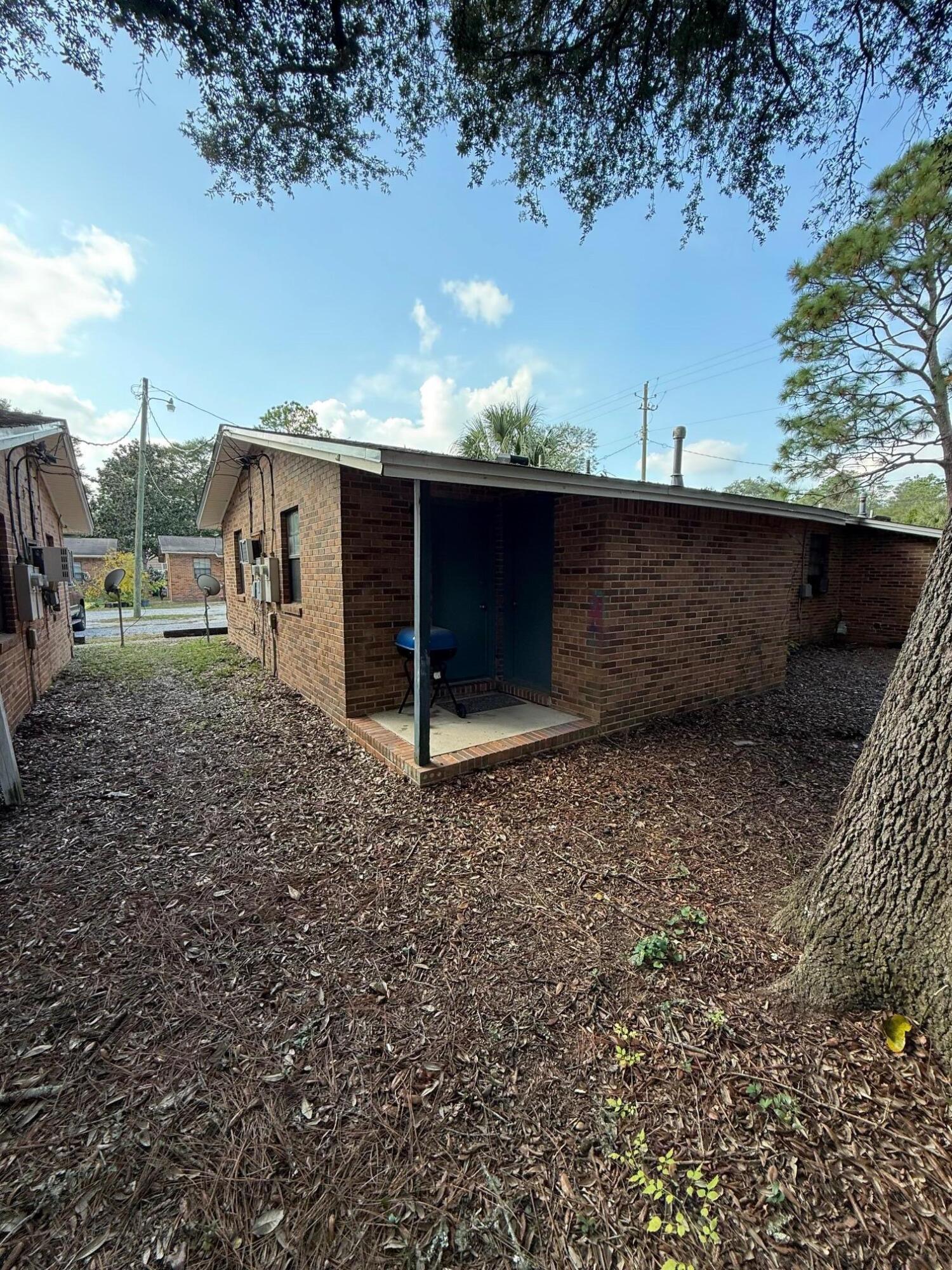 830 Cardinal Street, Unit 2 Fort Walton Beach, FL 32547 - Photo 11 of 11 a view of a backyard