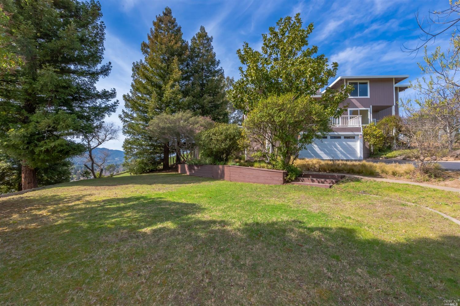 104 Bryan Drive Novato, CA 94945 - Photo 2 of 38 Huge level area at the front of the home.