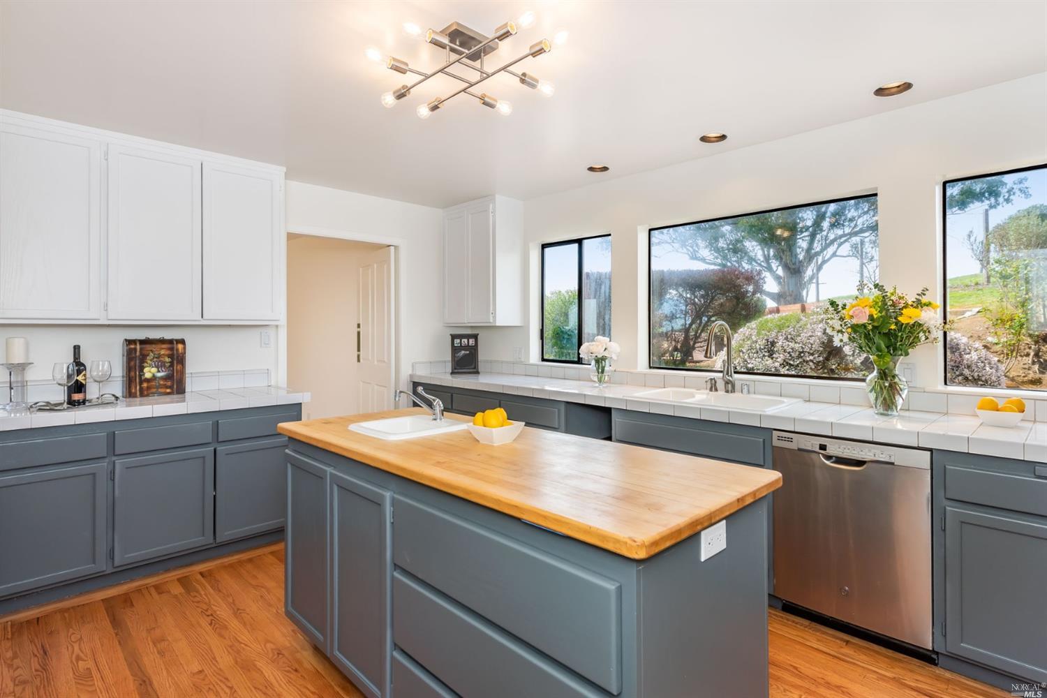104 Bryan Drive Novato, CA 94945 - Photo 11 of 38 Large kitchen looks out to the beautiful backyard.
