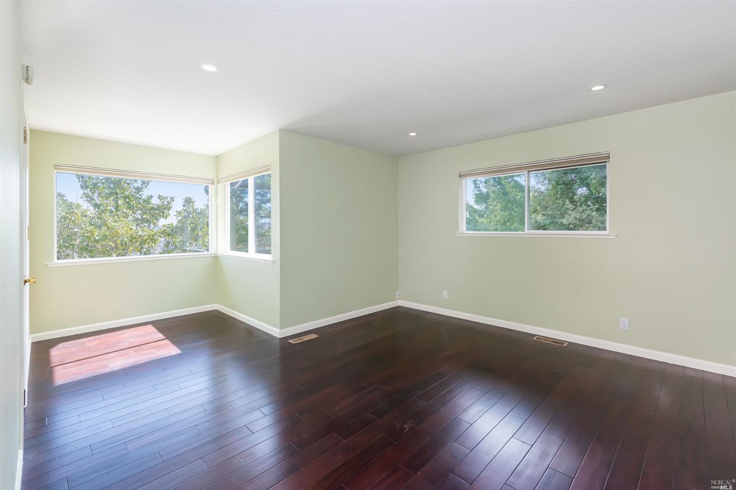 104 Bryan Drive Novato, CA 94945 - Photo 23 of 38 Main bedroom has a sitting area and has Bay views.