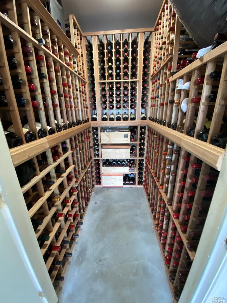 104 Bryan Drive Novato, CA 94945 - Photo 33 of 38 650+ custom mahogany sealed wine cellar with highly rated cooling unit (wine not included).