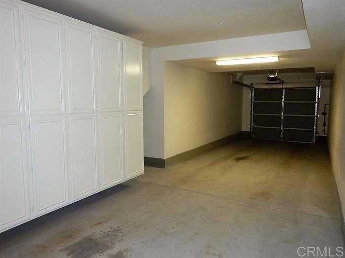 69 Via Sovana Santee, CA 92071 - Photo 13 of 17 an empty room with a wooden door