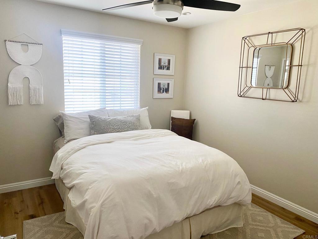 69 Via Sovana Santee, CA 92071 - Photo 5 of 17 a large white bed in a white room