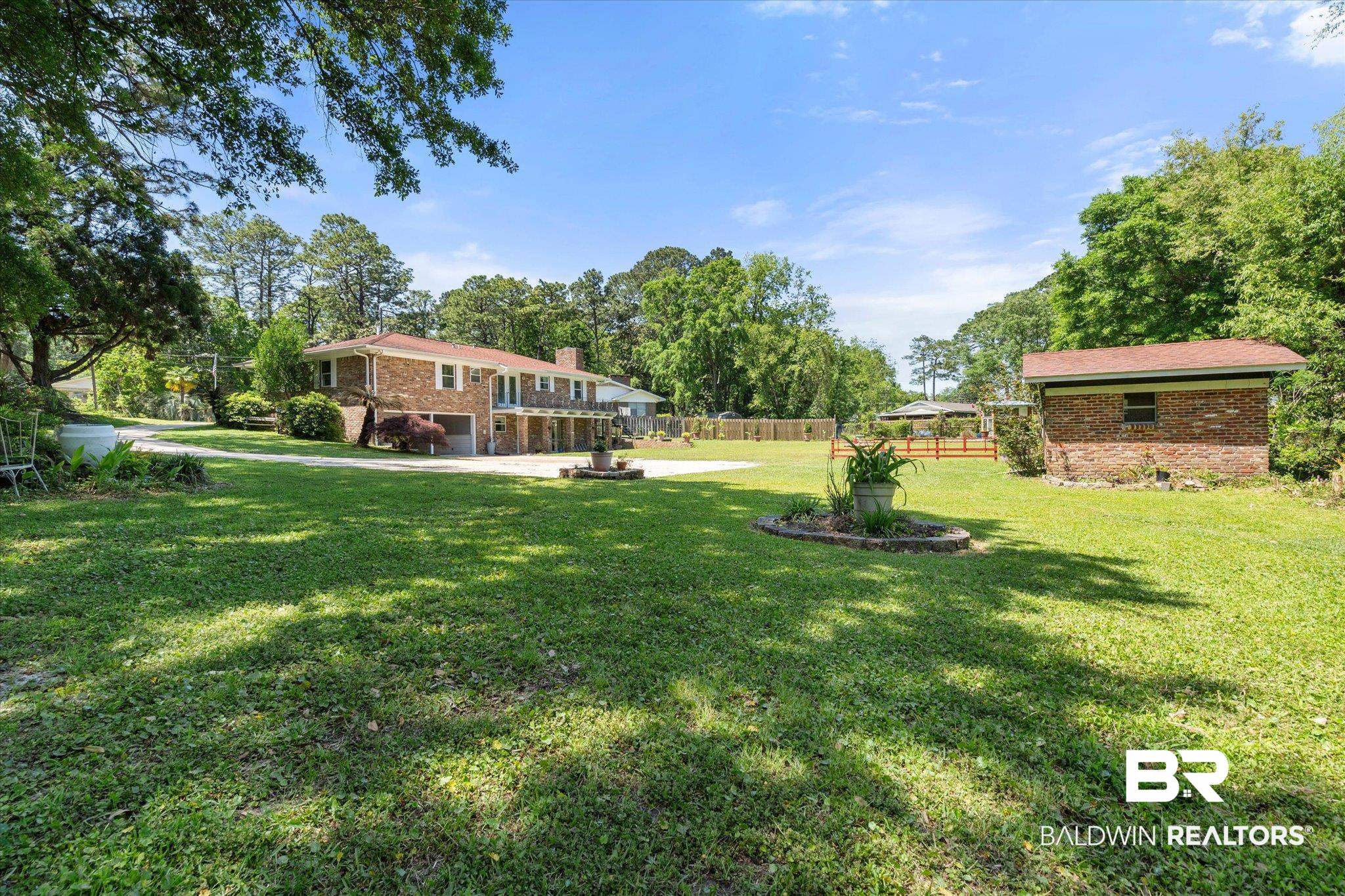 706 Sutherland Drive Chickasaw, AL 36611 - Photo 26 of 33 View of yard with fence, a patio area, and an attached garage