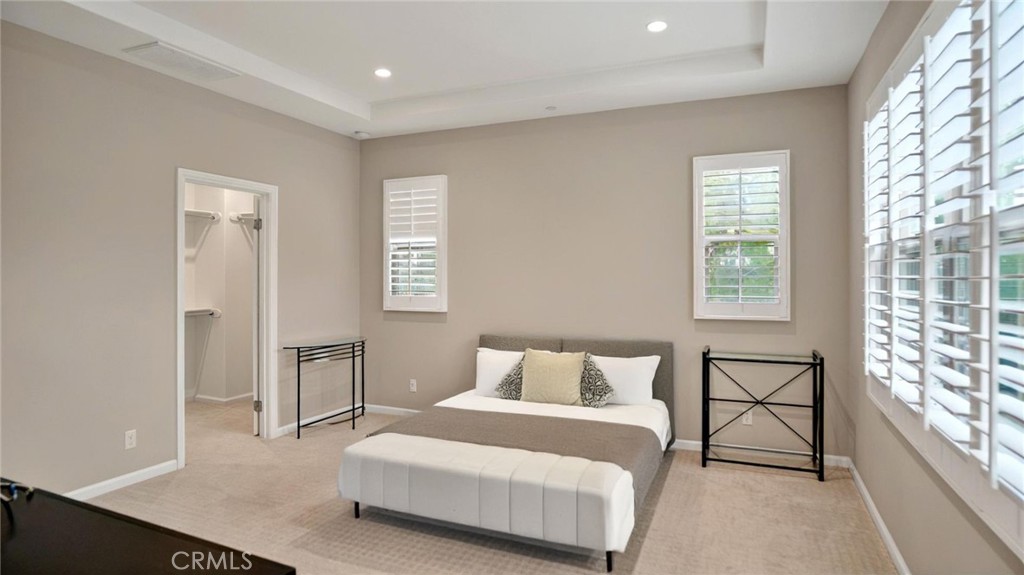 128 Gulfstream Irvine, CA 92620 - Photo 11 of 15 a bedroom with a bed and window