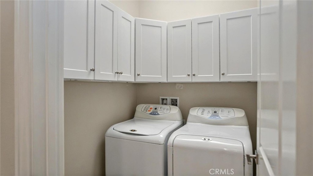 128 Gulfstream Irvine, CA 92620 - Photo 14 of 15 a utility room with dryer and washer