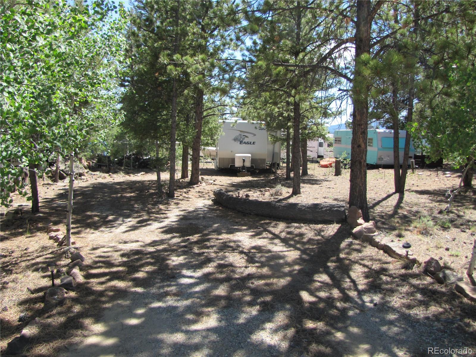 19 Lantern Loop Fairplay, CO 80440 - Photo 2 of 16 a tree in the middle of a yard