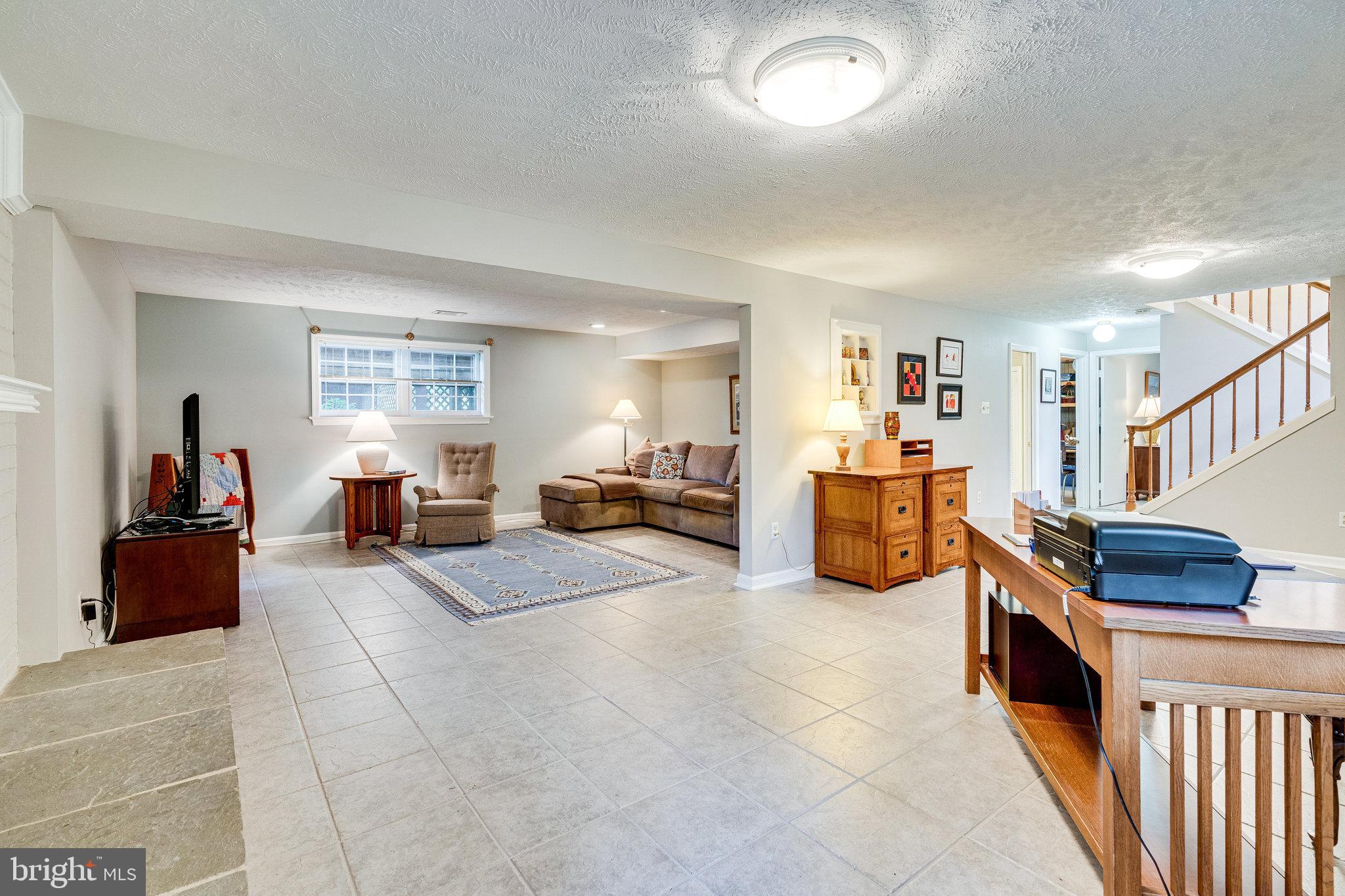 11605 Vale Road Oakton, VA 22124 - Photo 39 of 68 Expansive Recreation Rooms w/ Ceramic Tile Floors