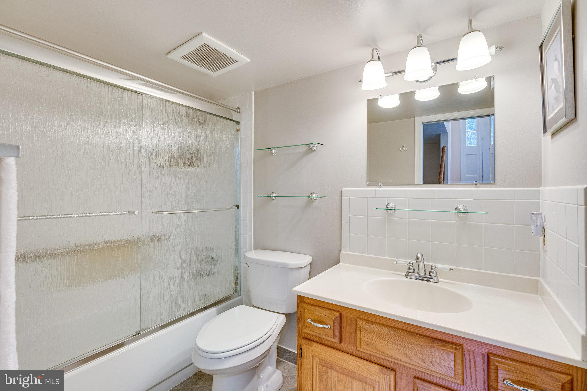 11605 Vale Road Oakton, VA 22124 - Photo 43 of 68 Renovated Lower Level Full Bath #3