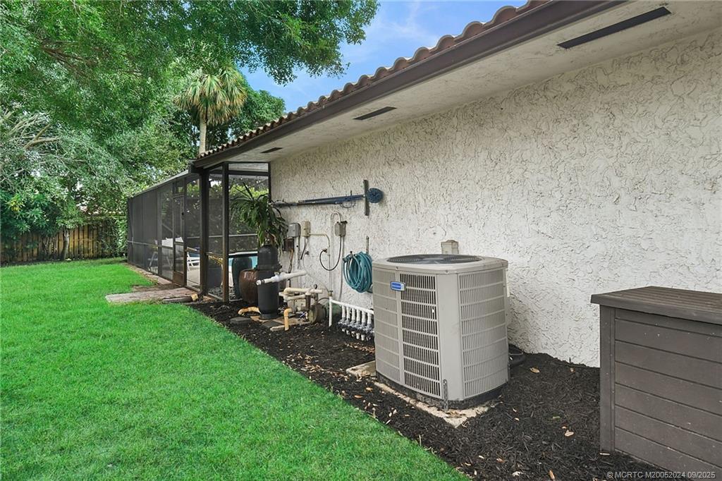 6 Copaire Road Sewall's Point, FL 34996 - Photo 12 of 76 a view of a house with backyard