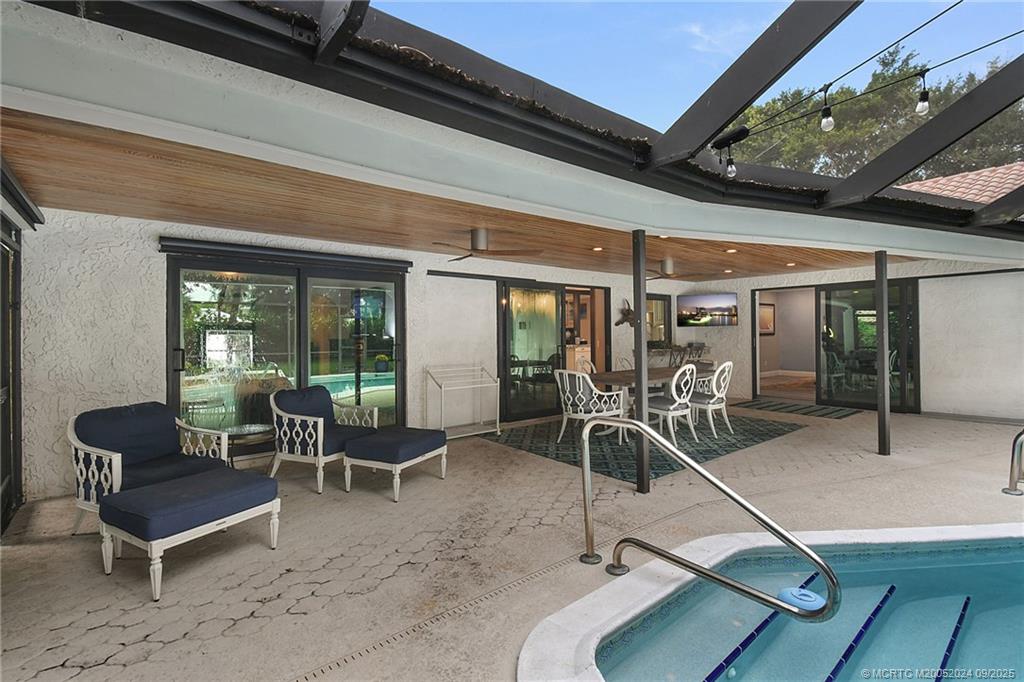 6 Copaire Road Sewall's Point, FL 34996 - Photo 18 of 76 a view of a room with gym equipment