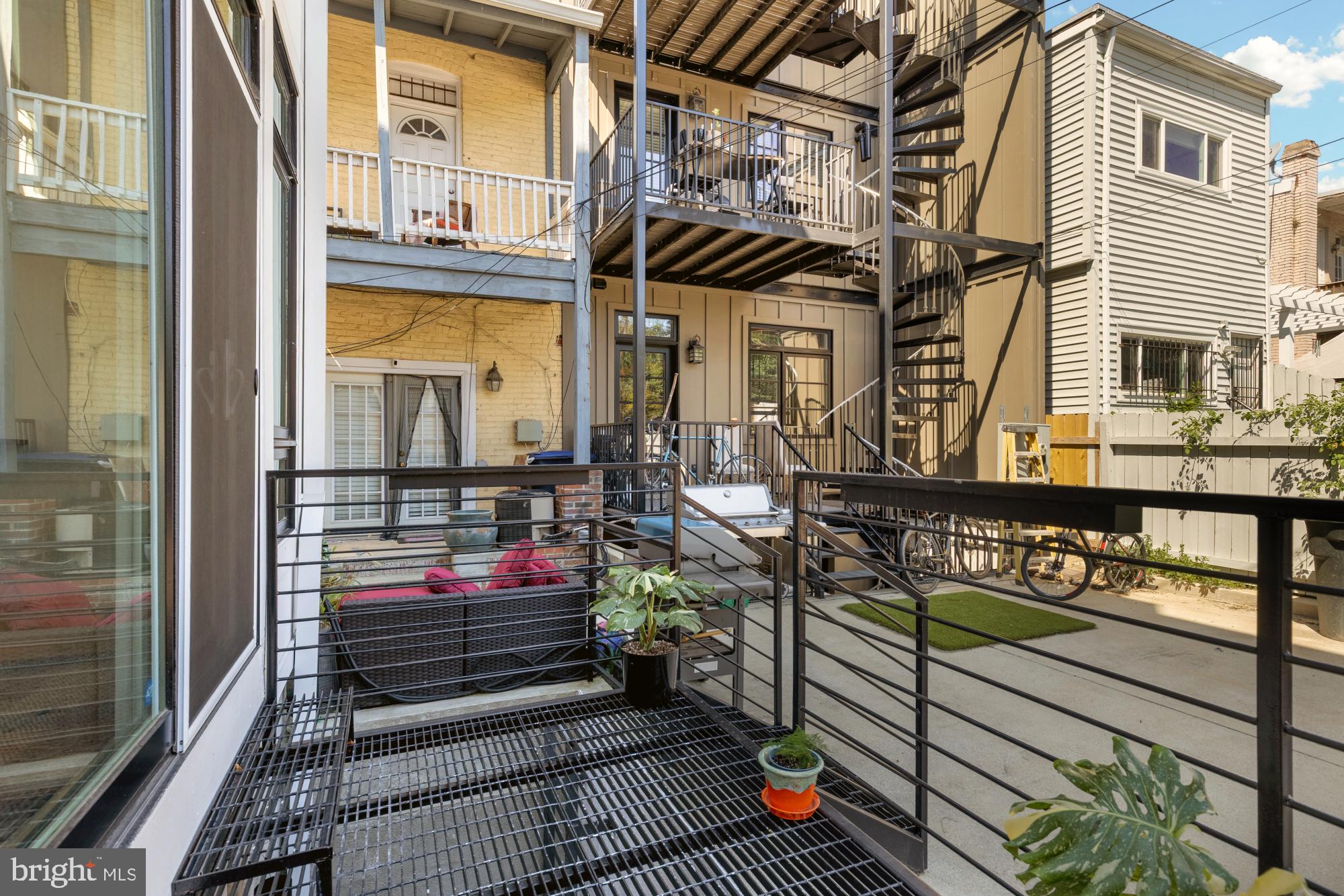 81 U Street Northwest, Unit A Washington, DC 20001 - Photo 25 of 46 a view of a street with sitting area