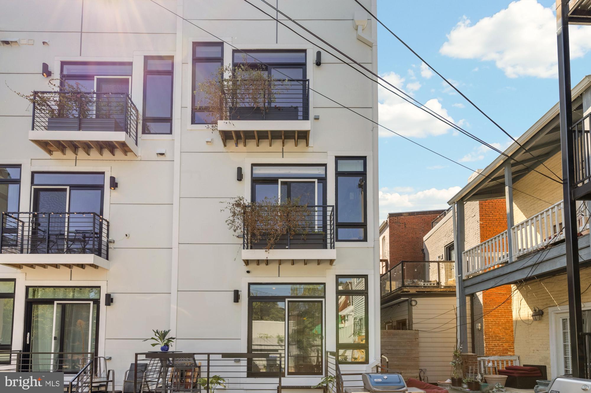 81 U Street Northwest, Unit A Washington, DC 20001 - Photo 28 of 46 a front view of a multi story building