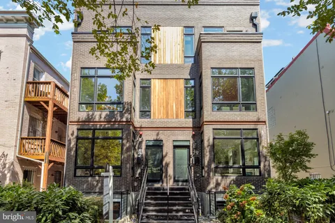 a front view of a multi story residential apartment building