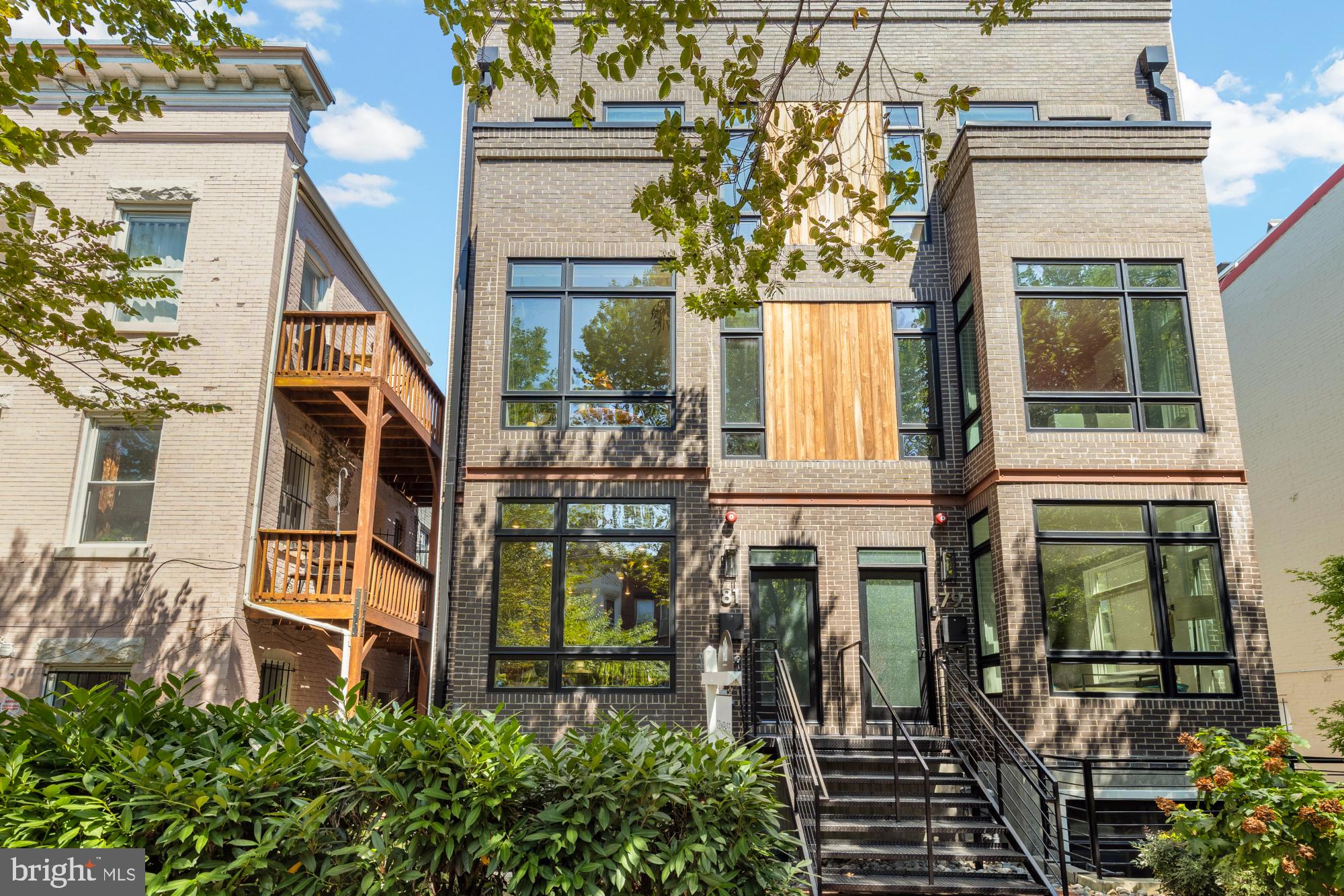 81 U Street Northwest, Unit A Washington, DC 20001 - Photo 44 of 46 a front view of a house with a yard