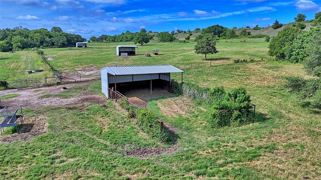 4509 Lazy E Road St. Jo, TX 76265 - Photo 20 of 39 a view of a garden with a big yard