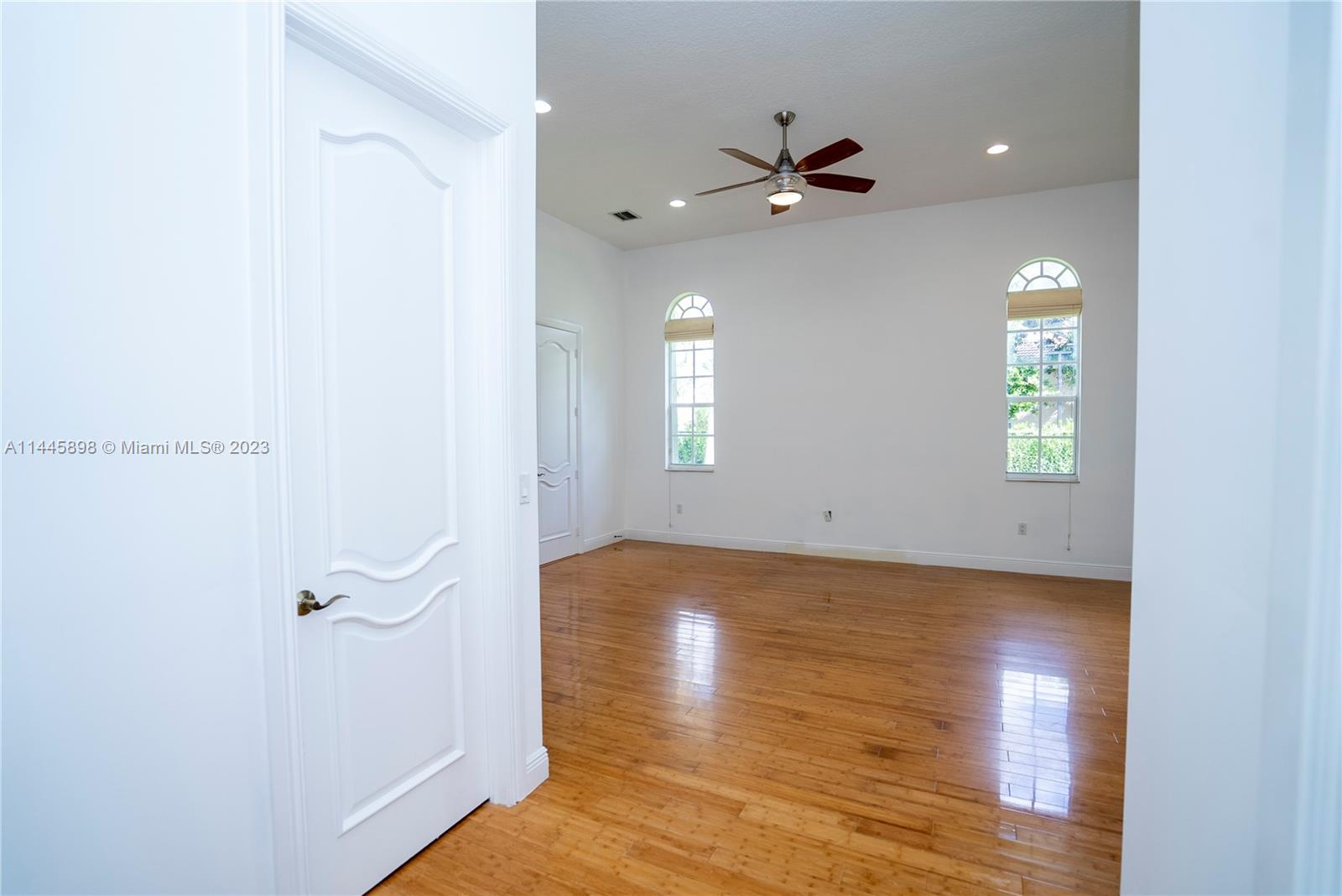 Kendall Miami, FL 33176 - Photo 16 of 28 a view of a room with wooden floor and fan
