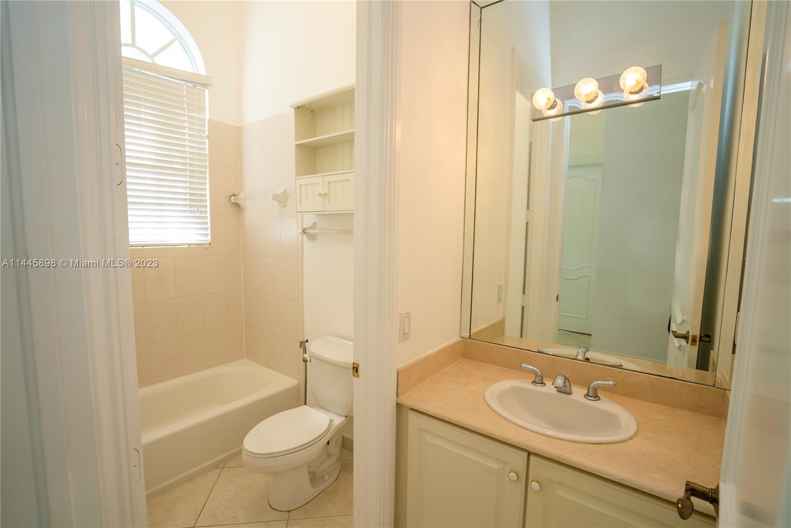 Kendall Miami, FL 33176 - Photo 23 of 28 a bathroom with a sink toilet and shower