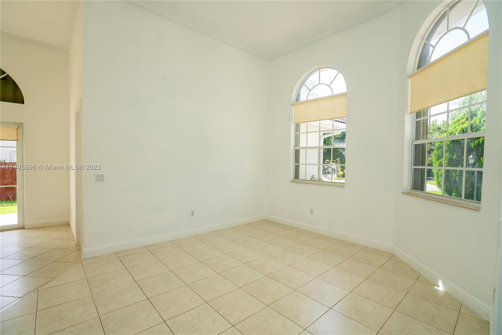Kendall Miami, FL 33176 - Photo 9 of 28 an empty room with windows